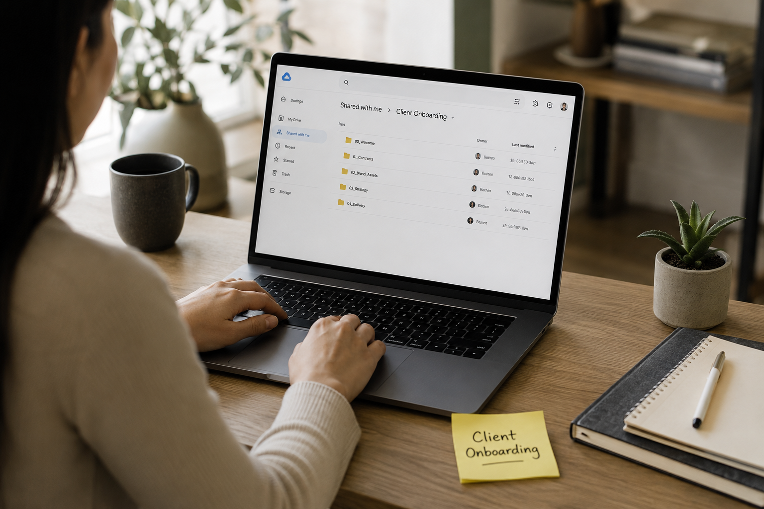 Virtual assistant setting up a client onboarding system on a laptop